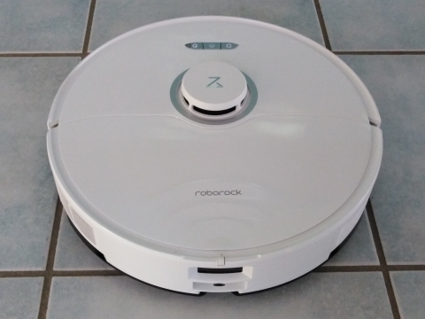 A close-up of a robot vacuum cleaner