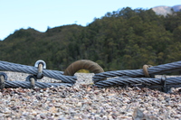 Southerly view from Darwin Dam wall with anchored steel cables in foreground 2